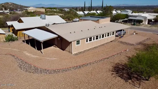 an aerial view of a house with a balcony
