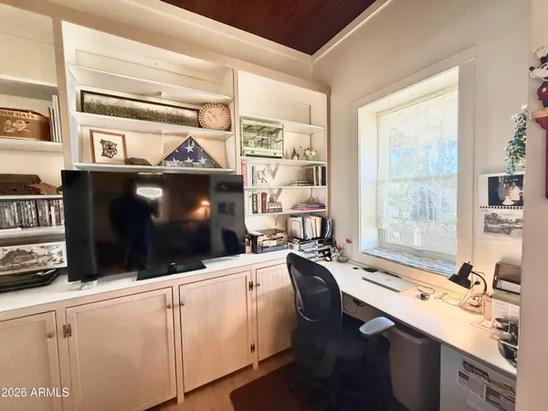 a kitchen with stainless steel appliances a sink a stove and a microwave
