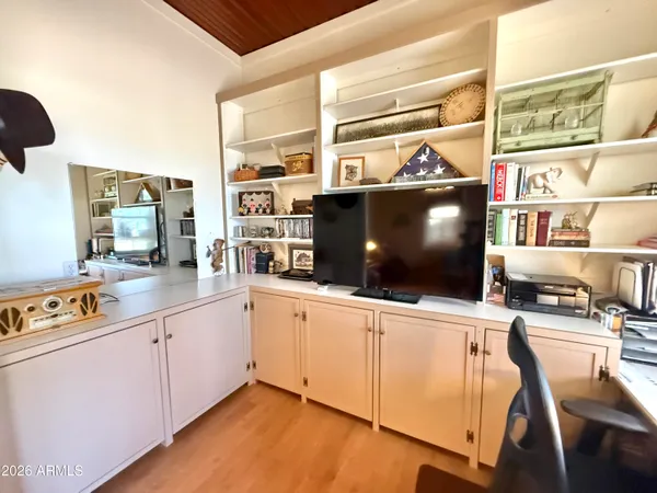 a kitchen with stainless steel appliances a stove and a microwave