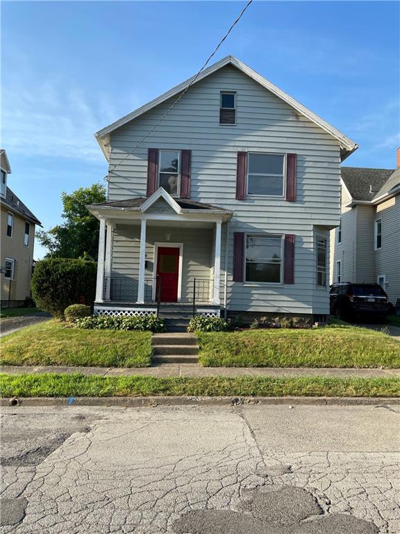 416 Sumner Avenue New Castle, PA 16105 - Photo 1 of 18 a front view of a house with a yard