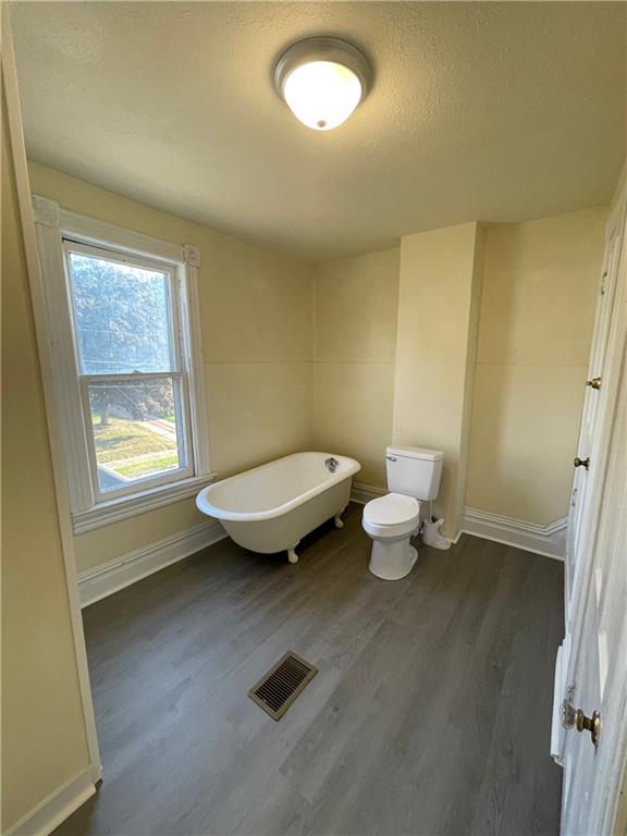 416 Sumner Avenue New Castle, PA 16105 - Photo 11 of 18 a bathroom with a toilet sink and a window