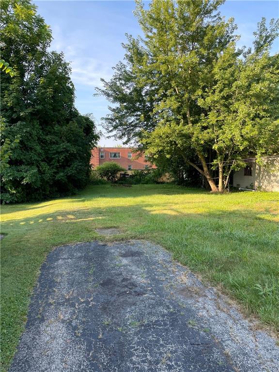 416 Sumner Avenue New Castle, PA 16105 - Photo 17 of 18 a view of a golf course with a large trees