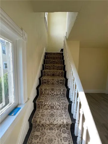 a view of entryway with stairs