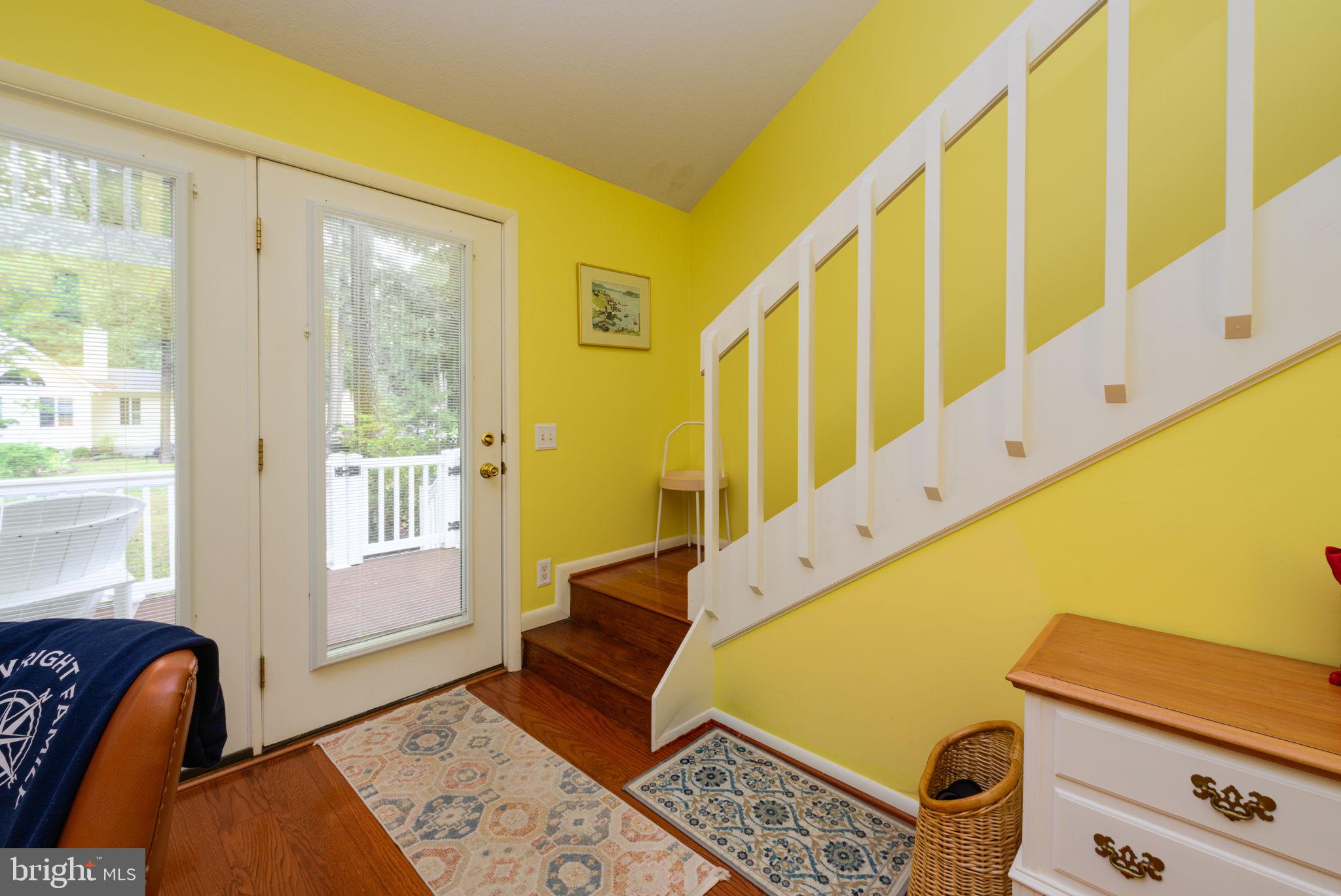10 Gloucester Road Ocean Pines, MD 21811 - Photo 20 of 37 a view of an entryway with wooden floor and windows