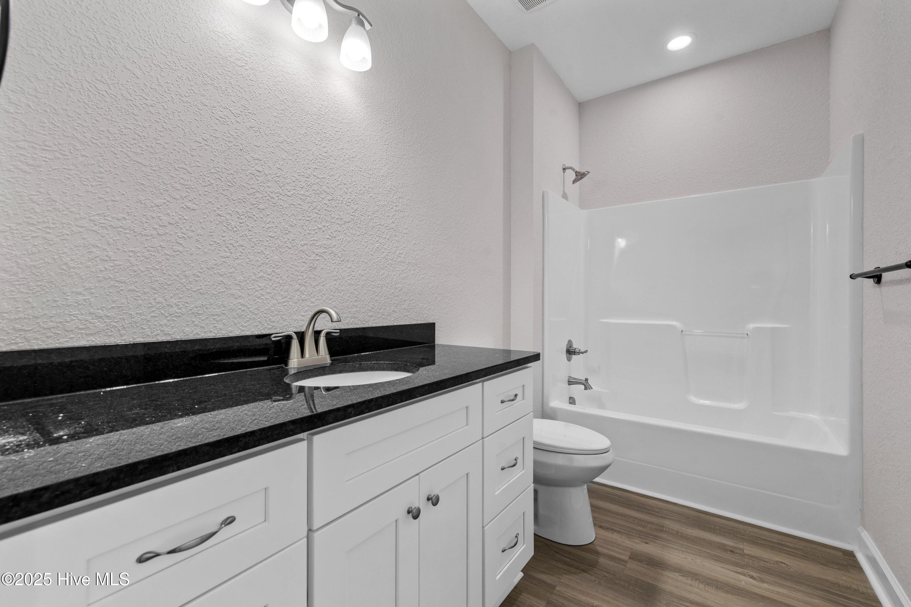 158 Texas Road Shiloh, NC 27974 - Photo 14 of 43 Hall Bathroom with granite top.