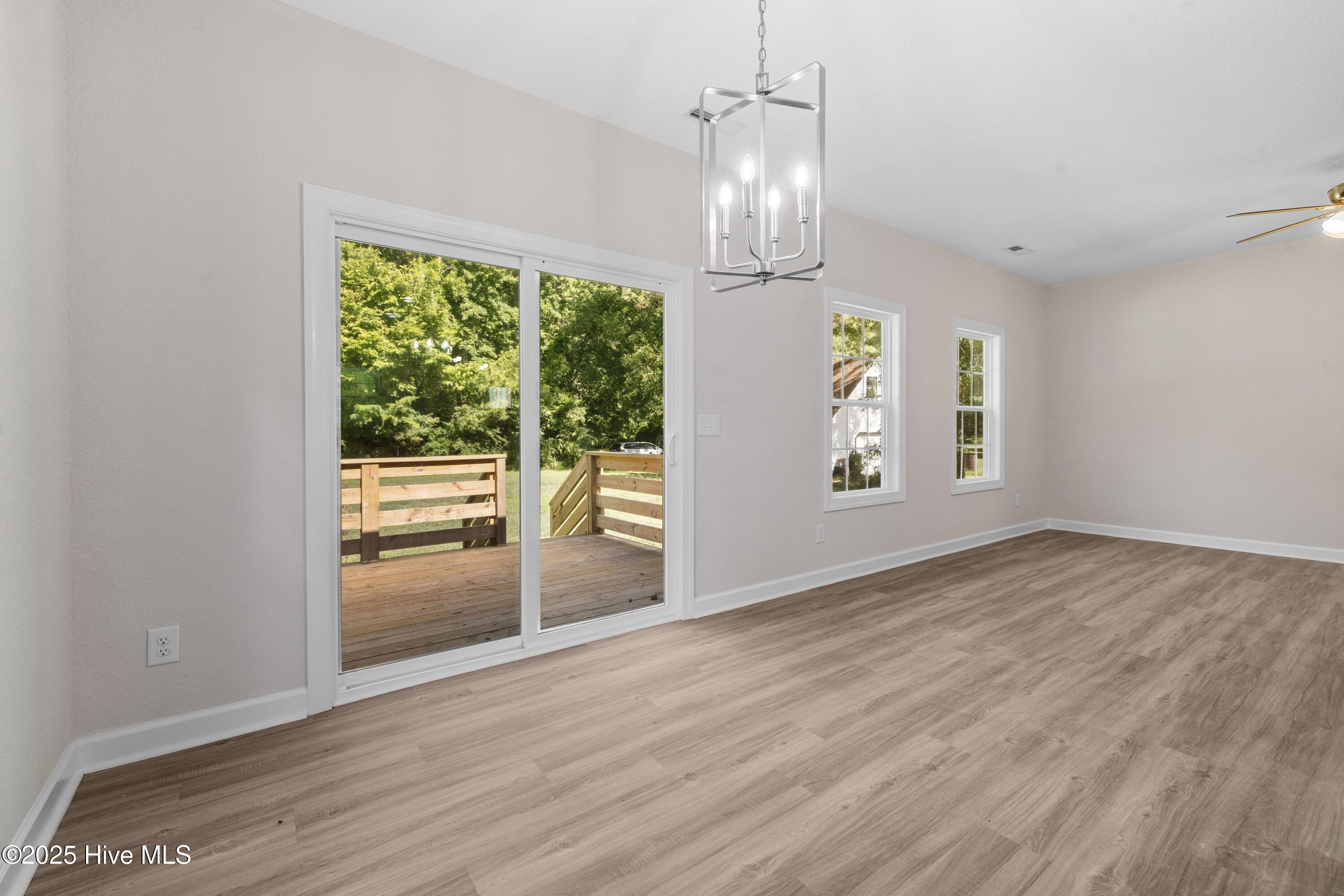 158 Texas Road Shiloh, NC 27974 - Photo 10 of 43 Dining to back deck.