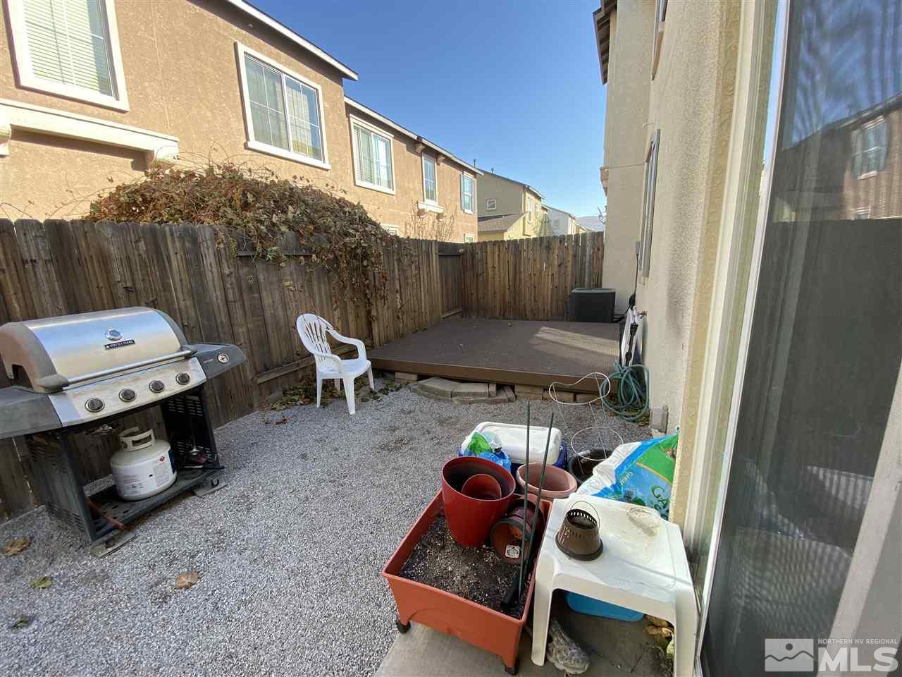 1935 Bears Ranch Drive Reno, NV 89521 - Photo 14 of 16 a backyard of a house with outdoor seating