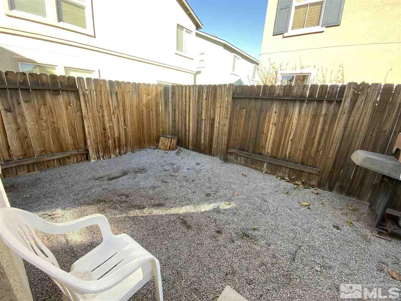 1935 Bears Ranch Drive Reno, NV 89521 - Photo 16 of 16 a backyard of a house with wooden fence