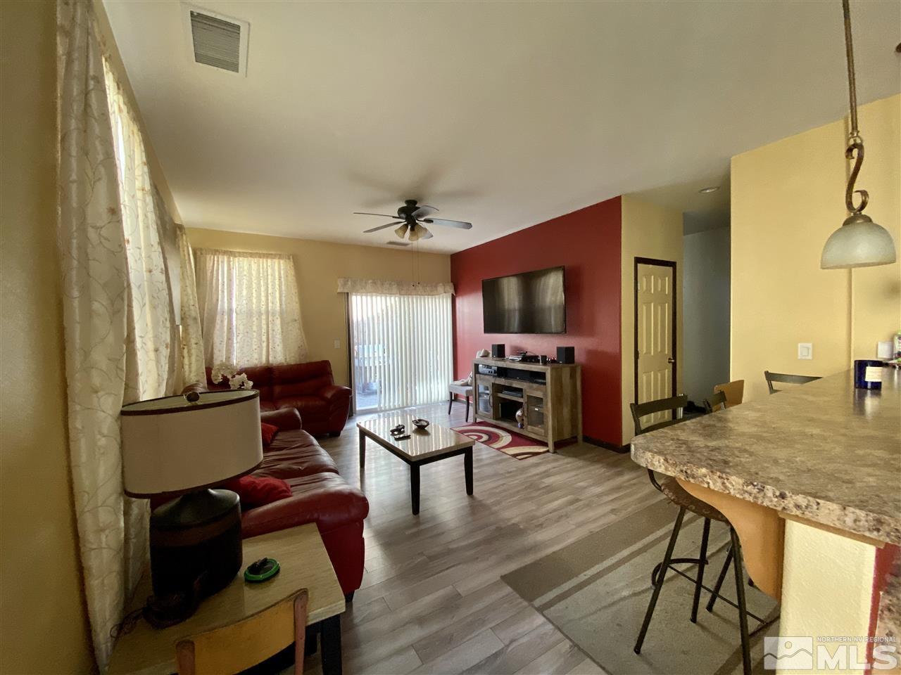 1935 Bears Ranch Drive Reno, NV 89521 - Photo 4 of 16 a living room with furniture and a flat screen tv