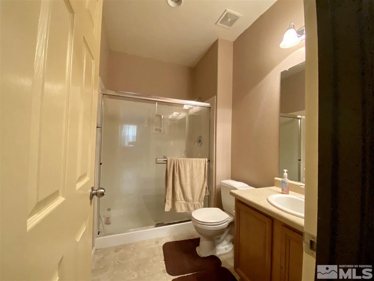 1935 Bears Ranch Drive Reno, NV 89521 - Photo 6 of 16 a bathroom with a toilet and a shower