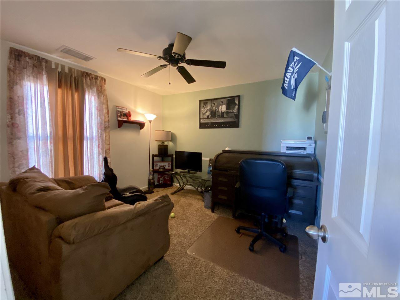 1935 Bears Ranch Drive Reno, NV 89521 - Photo 8 of 16 a living room with furniture and a window