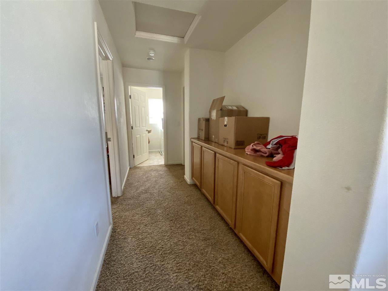 1935 Bears Ranch Drive Reno, NV 89521 - Photo 10 of 16 a view of a hallway with a couch