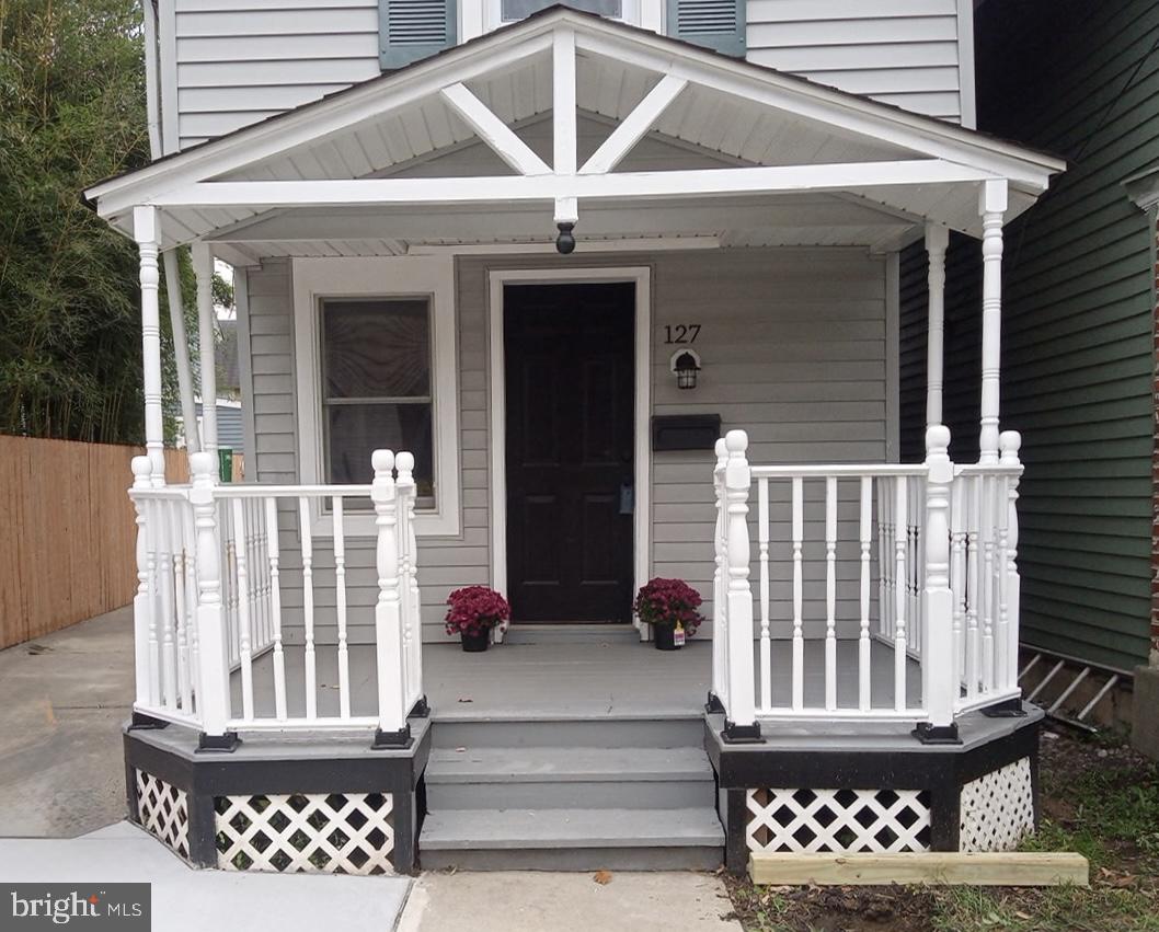 127 West Holly Avenue Pitman, NJ 08071 - Photo 3 of 23 a view of a brick house with a large window