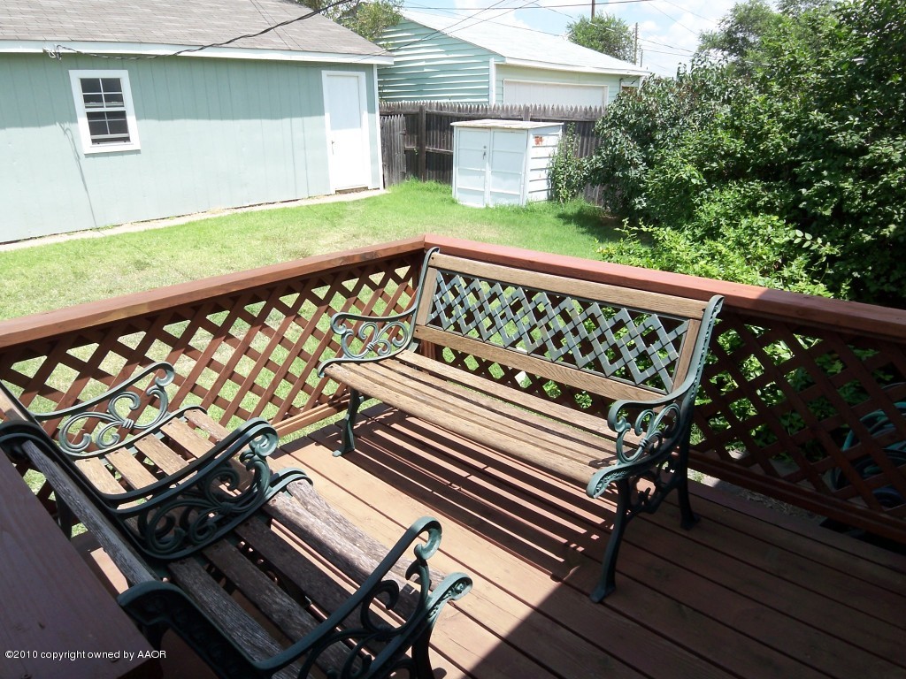 1614 Southwest 48th Avenue Amarillo, TX 79110 - Photo 7 of 13 a view of a balcony with wooden floor