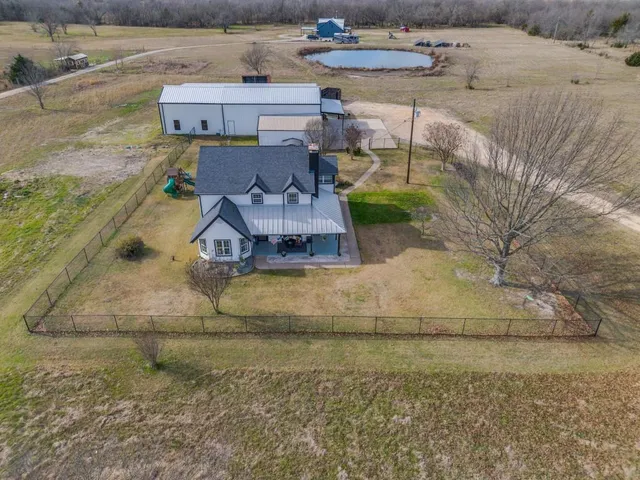 a view of a garage with cars