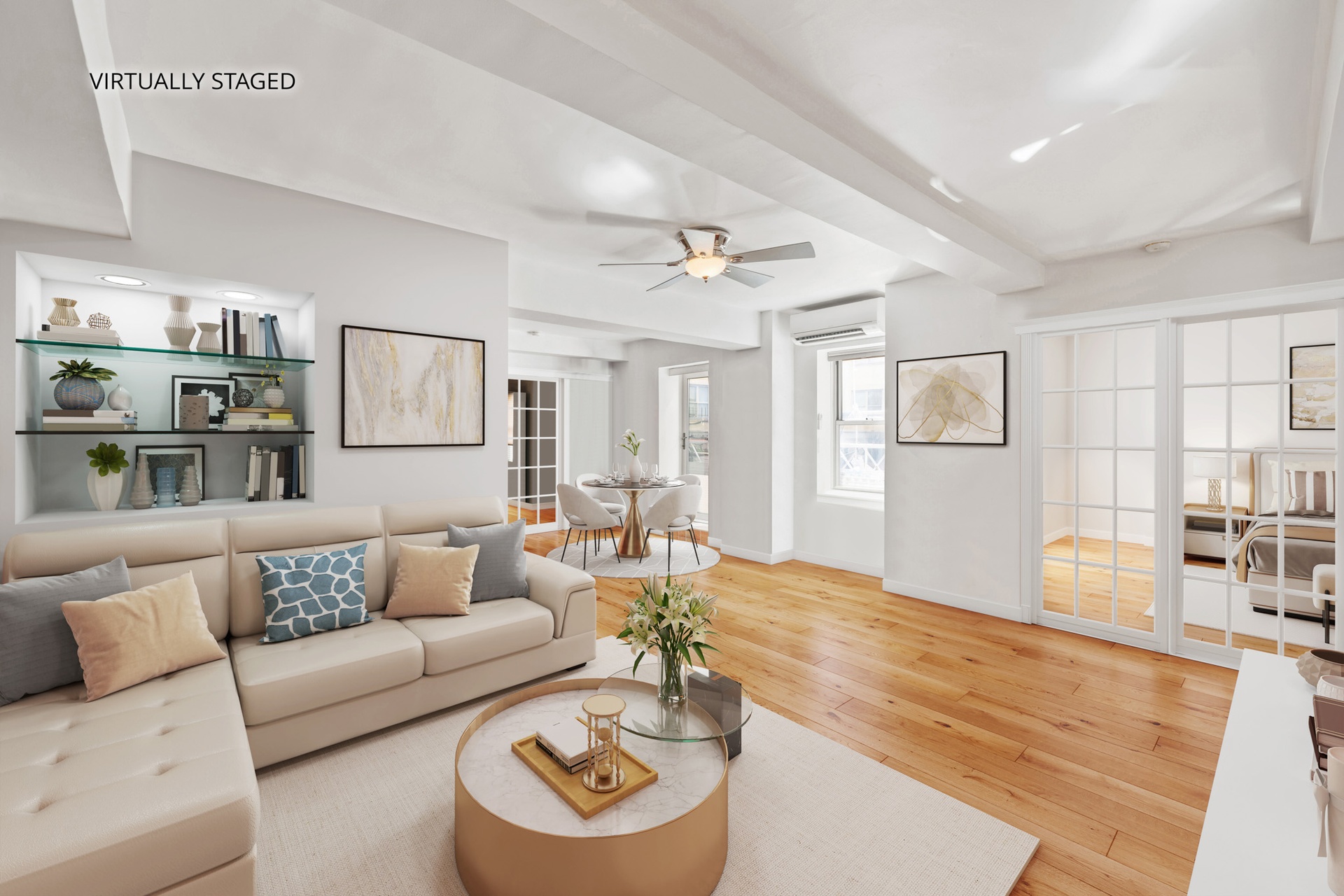 a living room with furniture and wooden floor