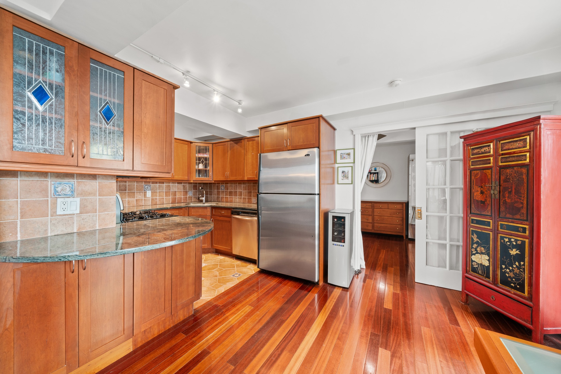 111 Hicks Street, Unit 5QR Brooklyn, NY 11201 - Photo 4 of 19 a kitchen with stainless steel appliances a refrigerator and a stove top oven