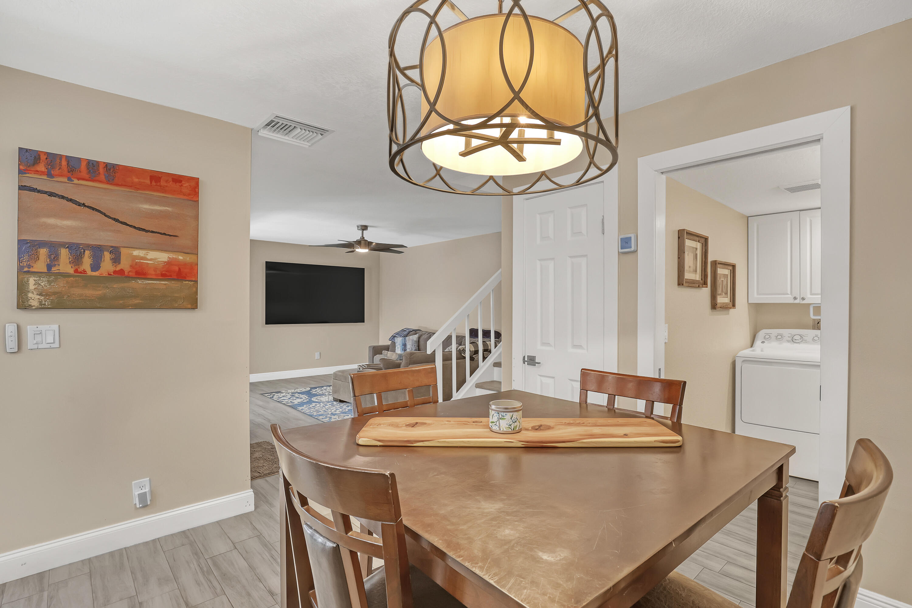 923 Springdale Circle Palm Springs, FL 33461 - Photo 12 of 26 a view of a dining room with furniture