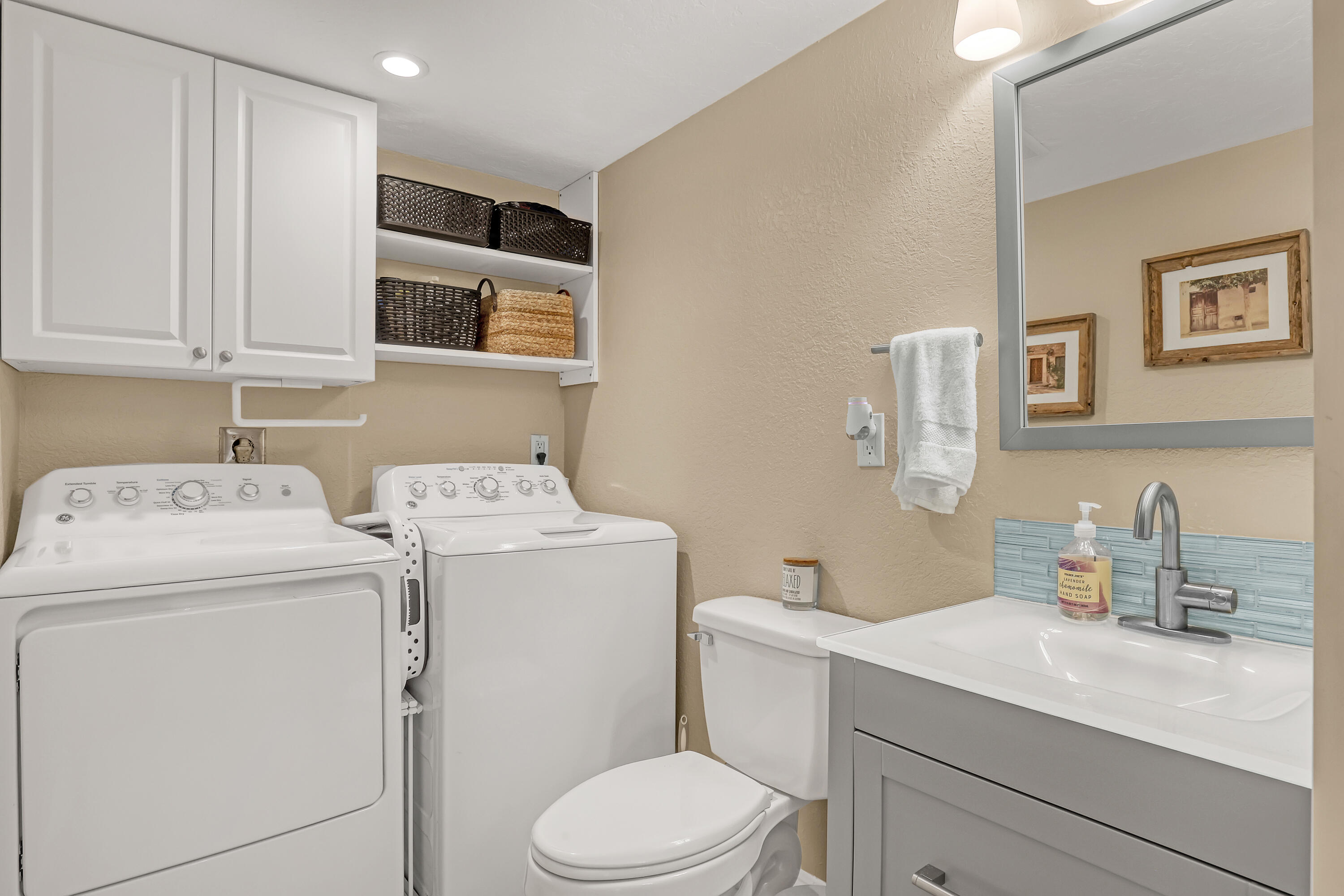 923 Springdale Circle Palm Springs, FL 33461 - Photo 15 of 26 a bathroom with a sink toilet and vanity