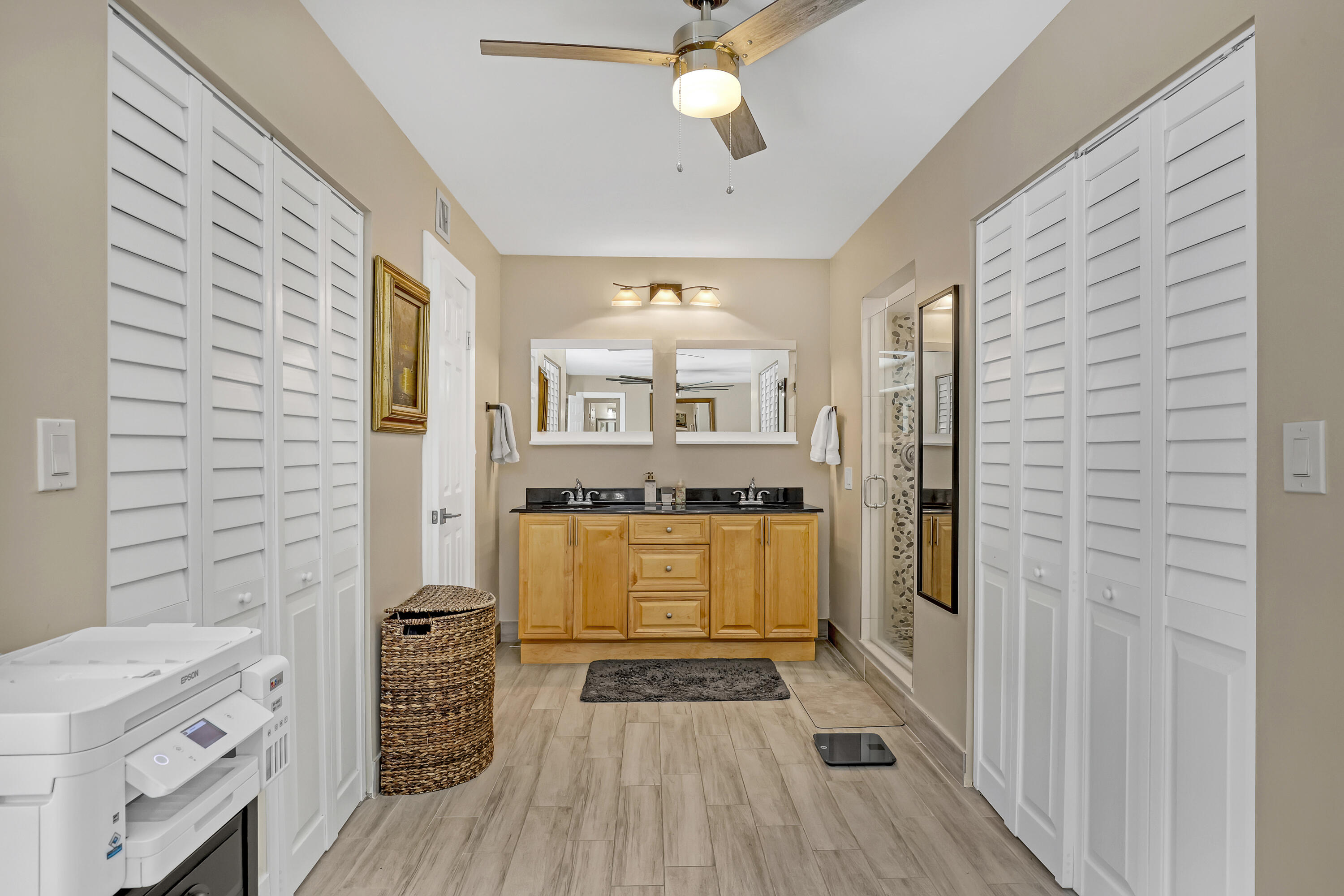 923 Springdale Circle Palm Springs, FL 33461 - Photo 18 of 26 a bathroom with a sink and a mirror