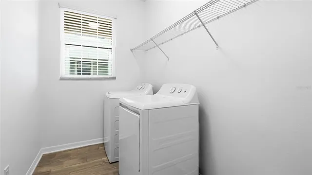 a utility room with dryer and washer