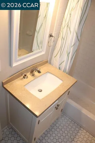 a bathroom with a sink and a bathtub