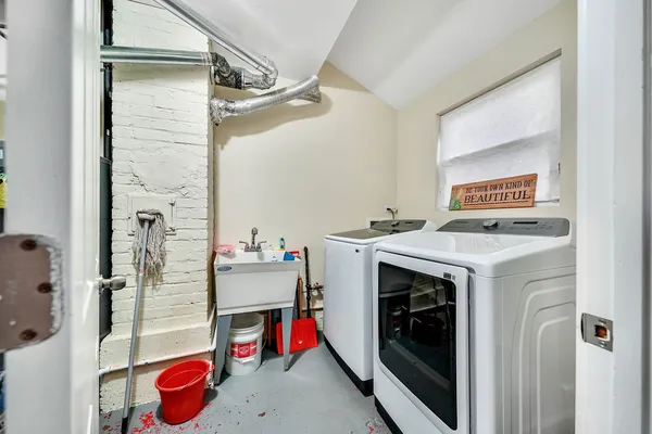 a utility room with dryer and washer