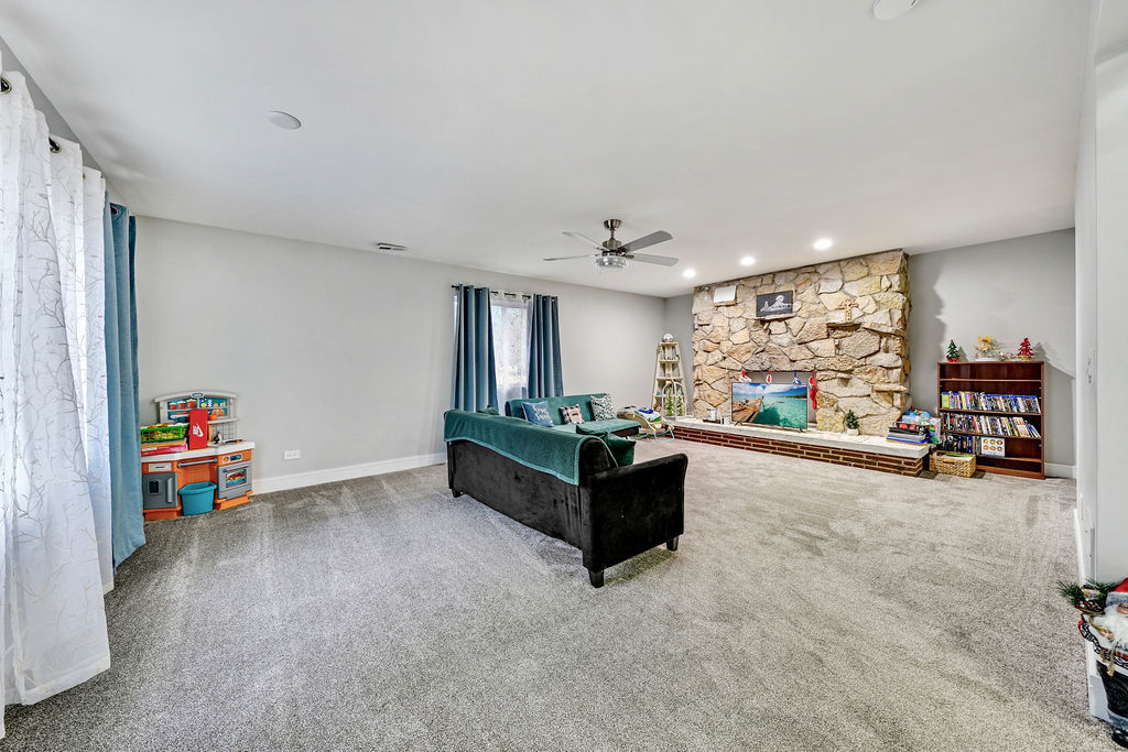 3315 West 161st Street Markham, IL 60428 - Photo 10 of 26 a living room with furniture and a wooden floor