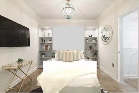 a bed room with a bed mirror and a window