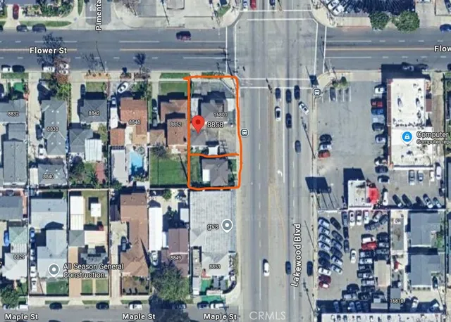 a bathroom with a sink mirror and painting on the wall