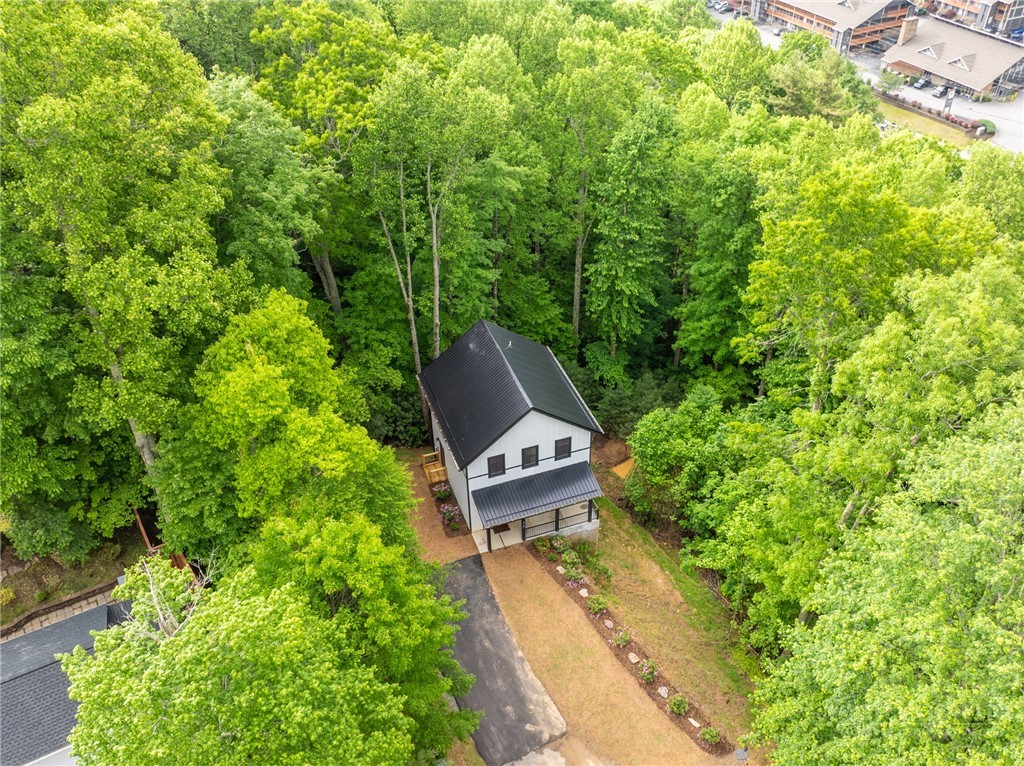 131 Bryce Way Boone, NC 28607 - Photo 26 of 38 an aerial view of a house with a garden