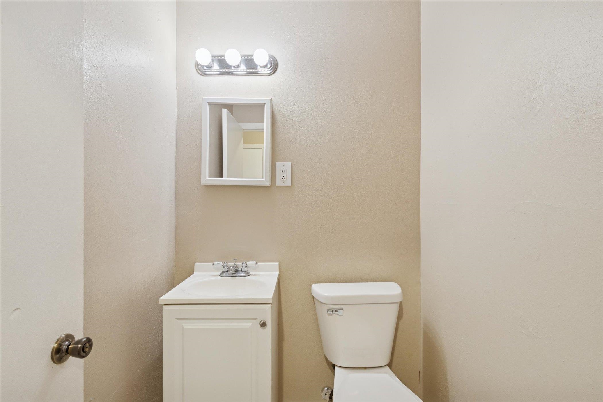 1120 Lincoln Avenue Rockford, IL 61102 - Photo 4 of 12 a bathroom with a toilet and a sink