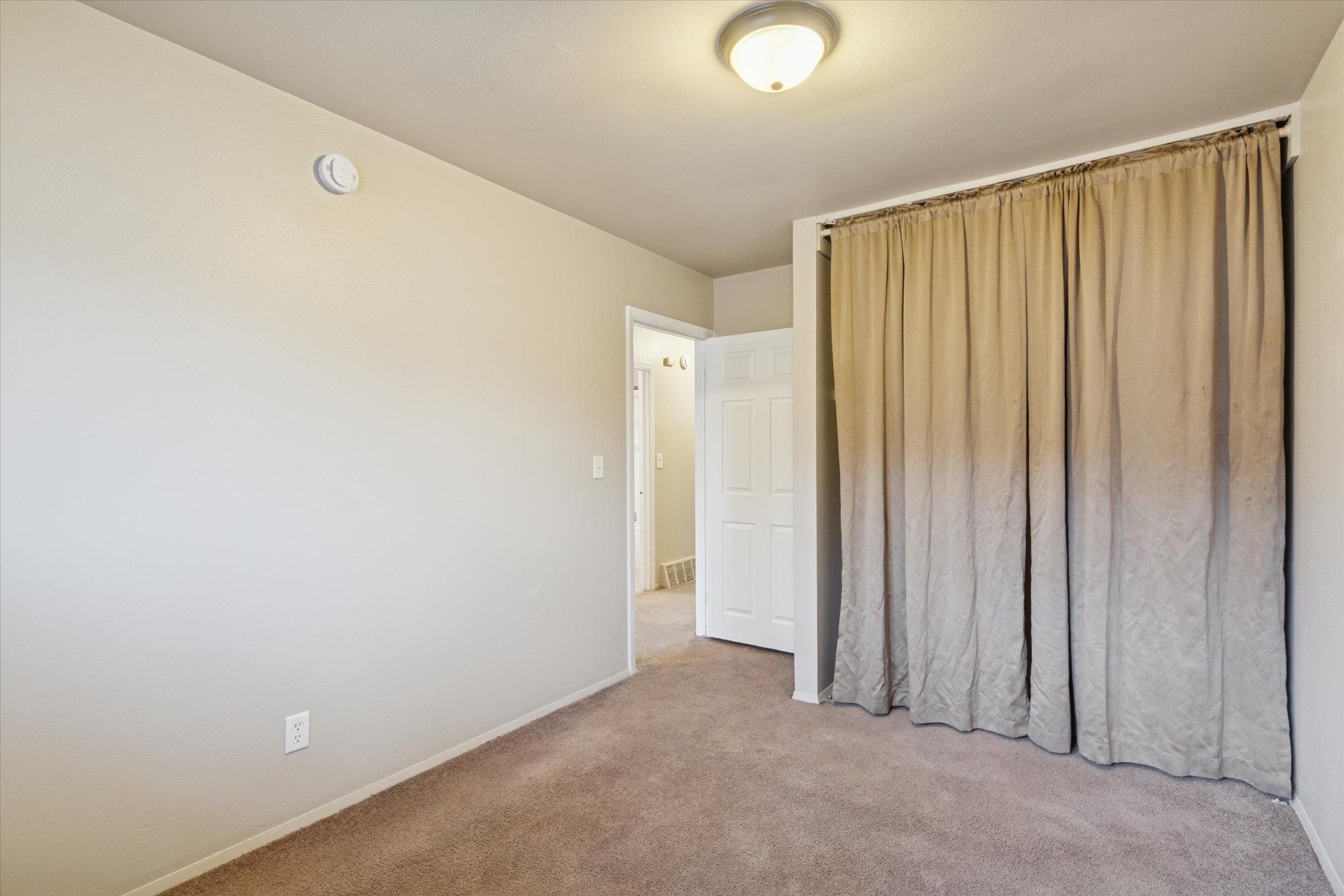 1120 Lincoln Avenue Rockford, IL 61102 - Photo 7 of 12 a view of a room with a wooden door