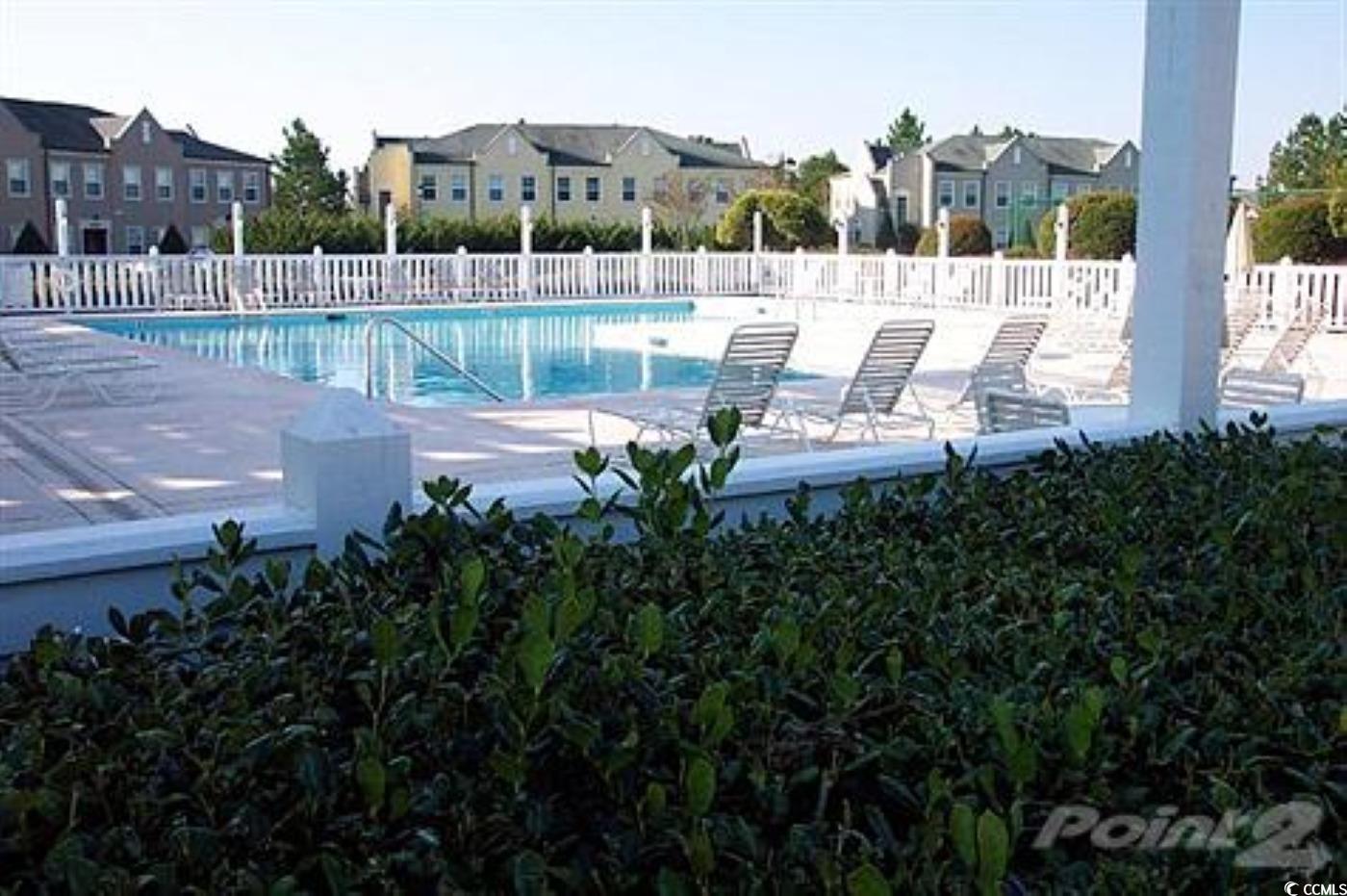 4431 Montrose Lane, Unit A Myrtle Beach, SC 29579 - Photo 32 of 32 Community pool with a patio area and a residential view