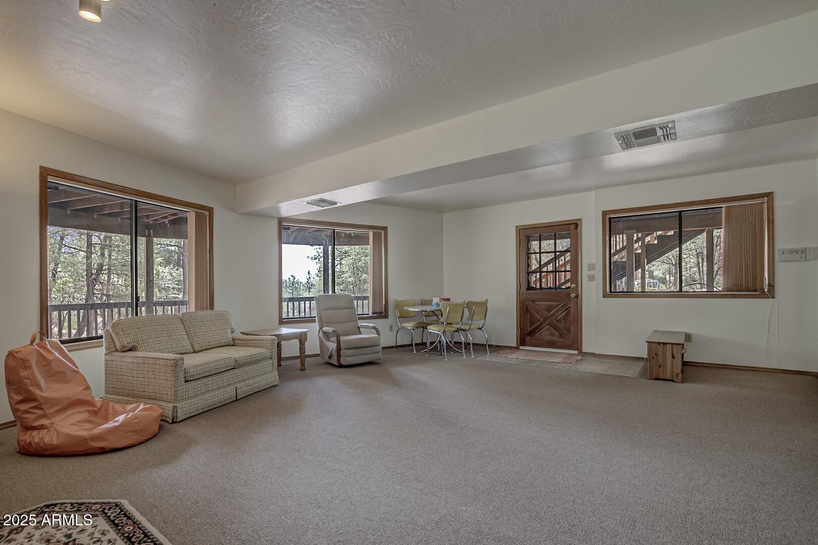 5838 Arroyo Way Pine, AZ 85544 - Photo 27 of 53 a living room with furniture