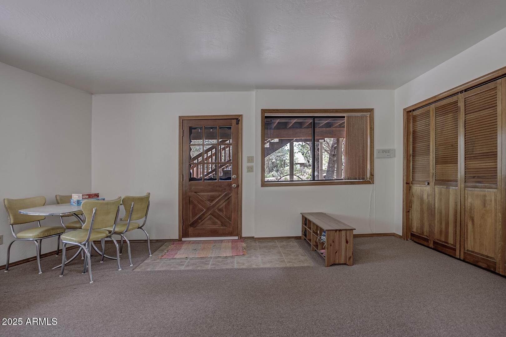 5838 Arroyo Way Pine, AZ 85544 - Photo 29 of 53 a living room with furniture and a window