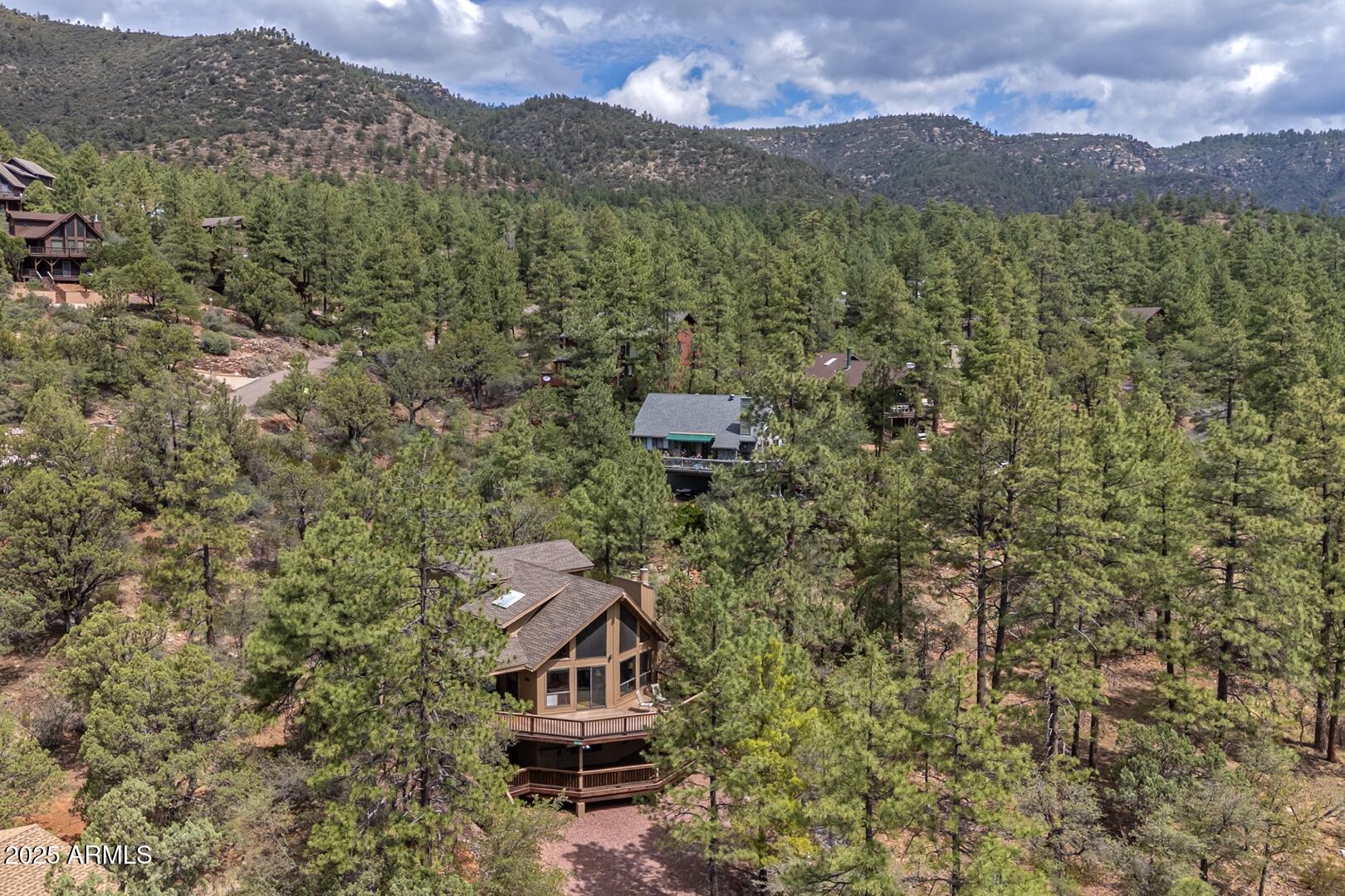 5838 Arroyo Way Pine, AZ 85544 - Photo 32 of 53 a picture of a city with mountain