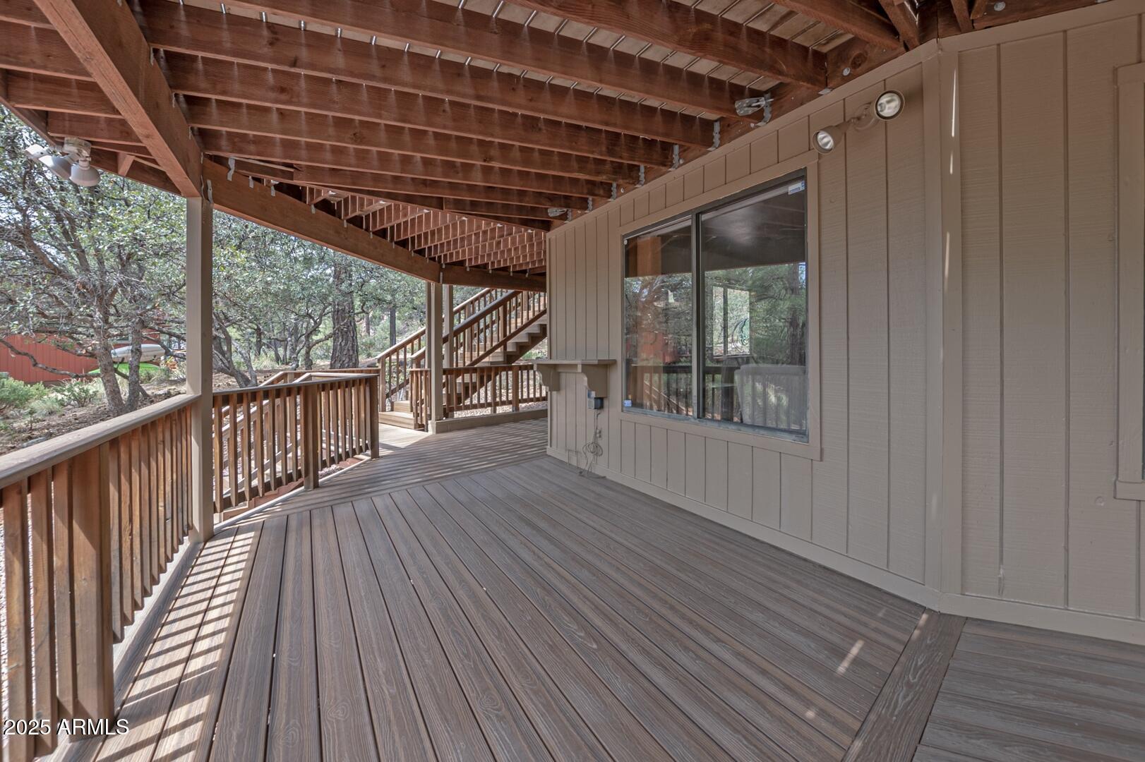 5838 Arroyo Way Pine, AZ 85544 - Photo 33 of 53 a view of porch with wooden floor