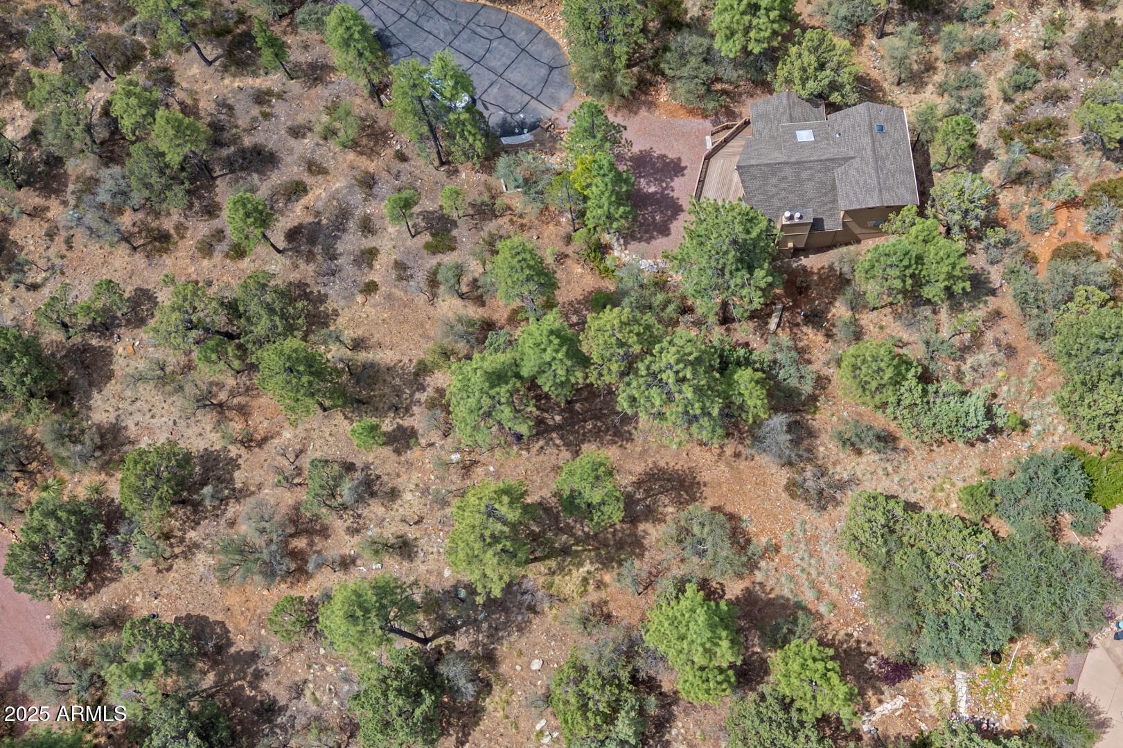 5838 Arroyo Way Pine, AZ 85544 - Photo 36 of 53 an aerial view of house with yard and mountain view in back