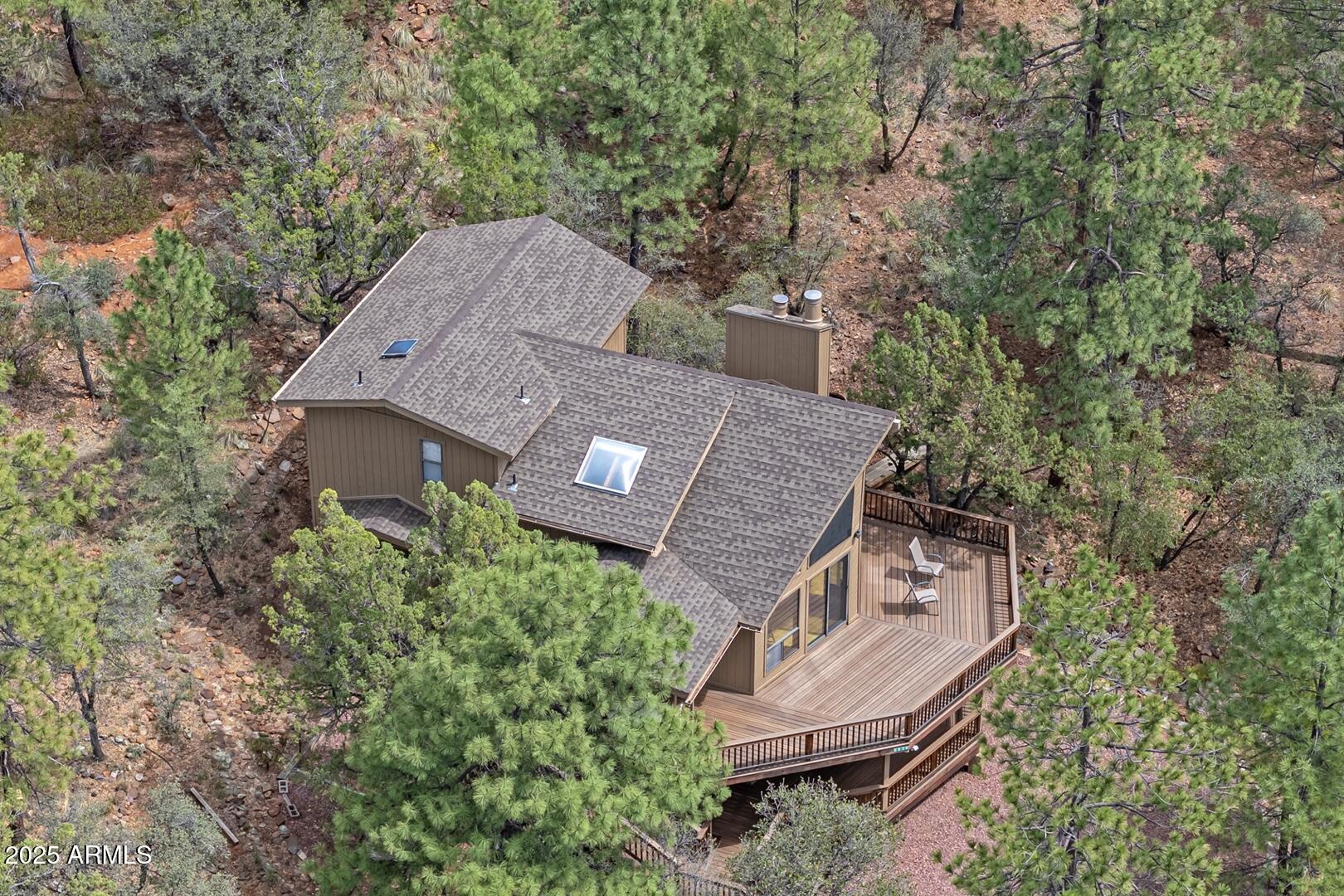 5838 Arroyo Way Pine, AZ 85544 - Photo 37 of 53 an aerial view of a house with a yard
