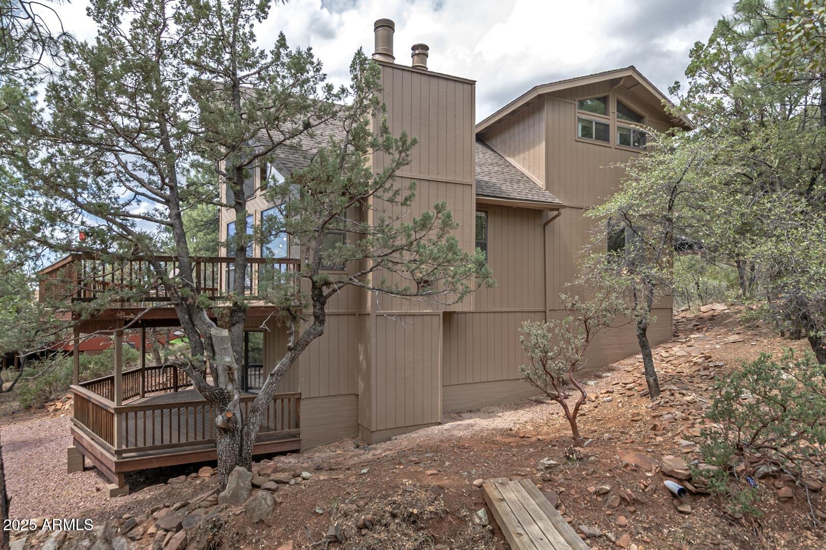 5838 Arroyo Way Pine, AZ 85544 - Photo 50 of 53 a view of house with a outdoor space