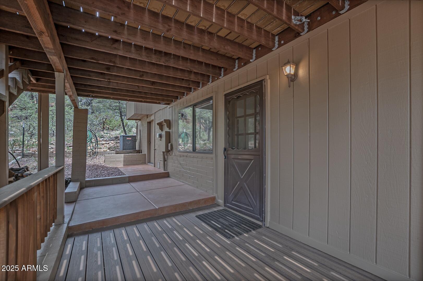 5838 Arroyo Way Pine, AZ 85544 - Photo 52 of 53 a view of porch with wooden floor