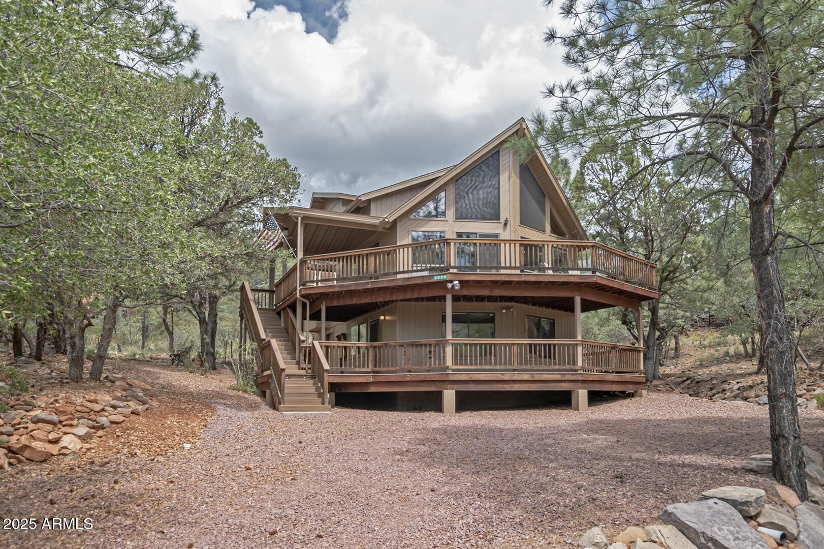 5838 Arroyo Way Pine, AZ 85544 - Photo 53 of 53 a front view of a house with a yard