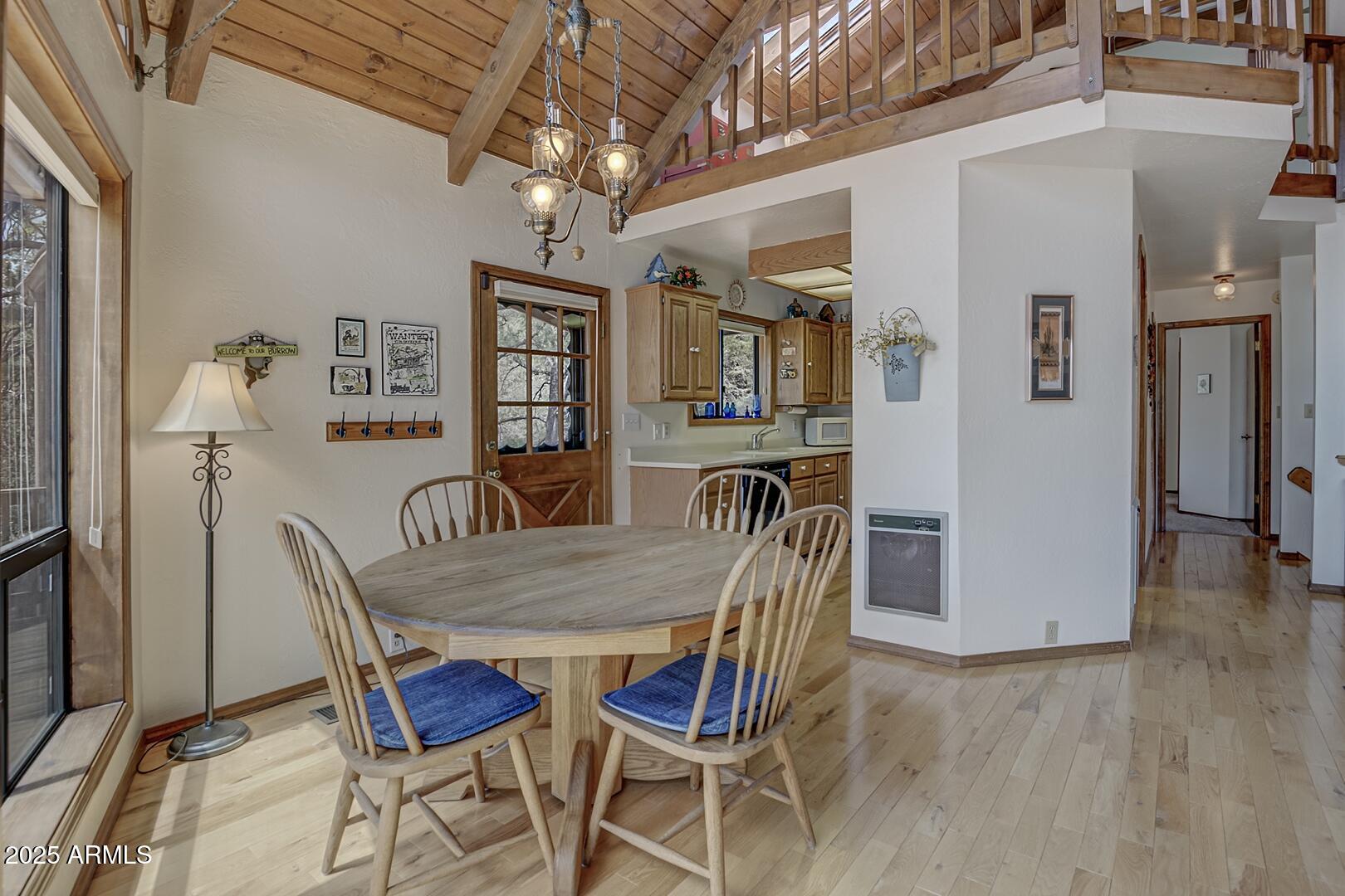 5838 Arroyo Way Pine, AZ 85544 - Photo 9 of 53 a dining room with furniture and window