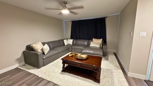809 Peacock Court Las Vegas, NV 89145 - Photo 5 of 15 Living room featuring a textured wall, ceiling fan, and luxury vinyl plank floors