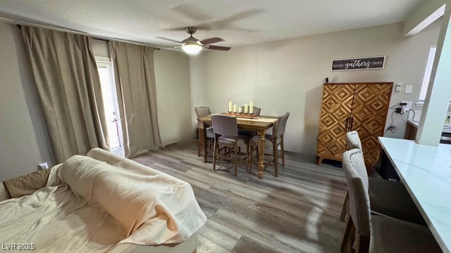 809 Peacock Court Las Vegas, NV 89145 - Photo 6 of 15 Dining space featuring luxury vinyl plank floors and ceiling fan