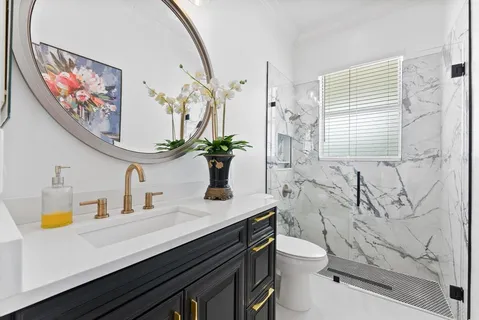 a view of a swimming pool with a patio