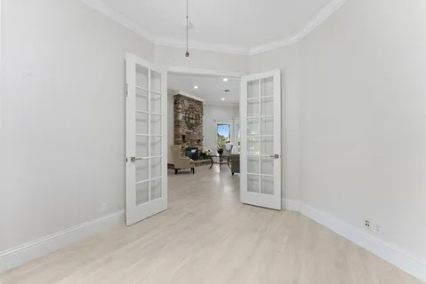 a view of a swimming pool with an outdoor space and seating area