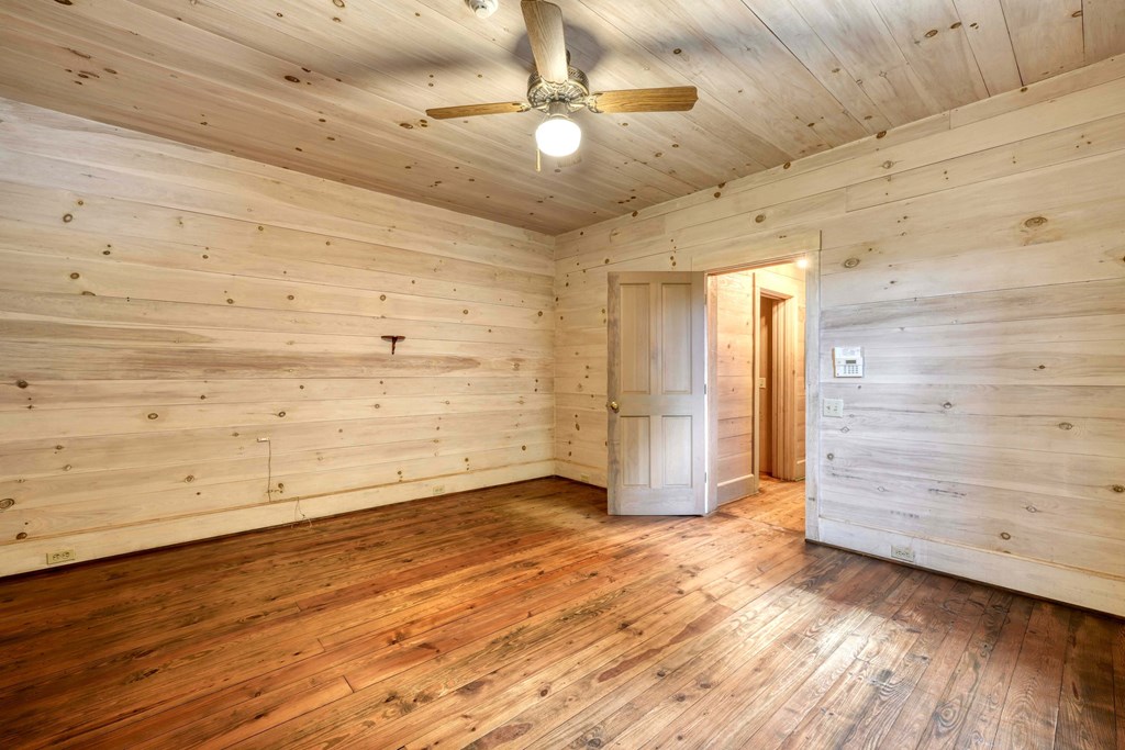 2350 Dial Road Blue Ridge, GA 30513 - Photo 18 of 76 wooden floor in an empty room
