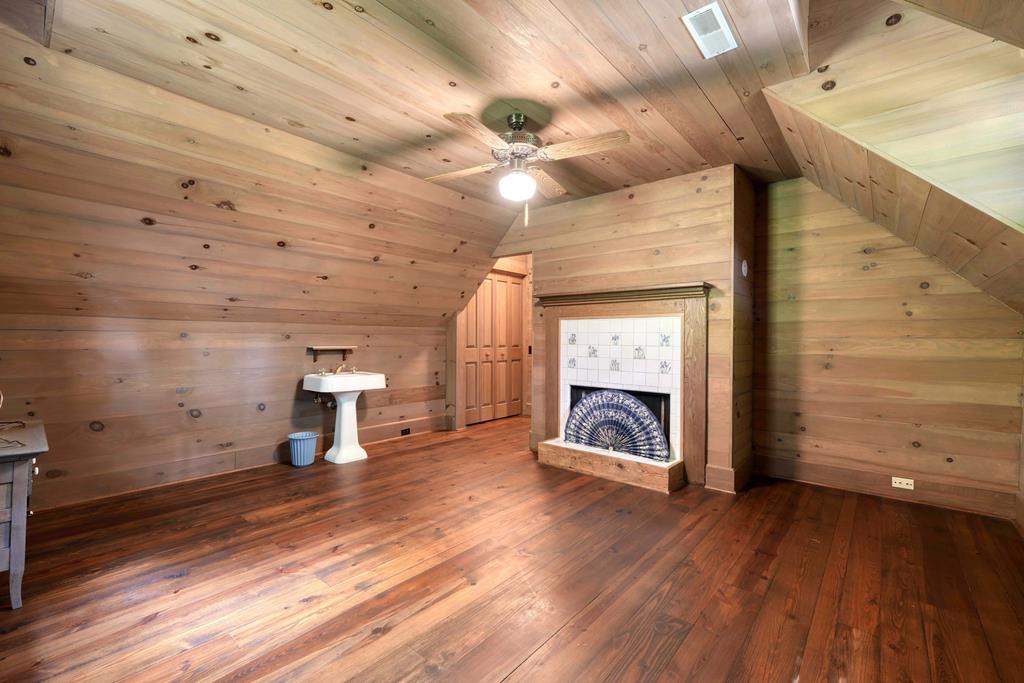 2350 Dial Road Blue Ridge, GA 30513 - Photo 30 of 76 a view of an empty room with a fireplace and a window